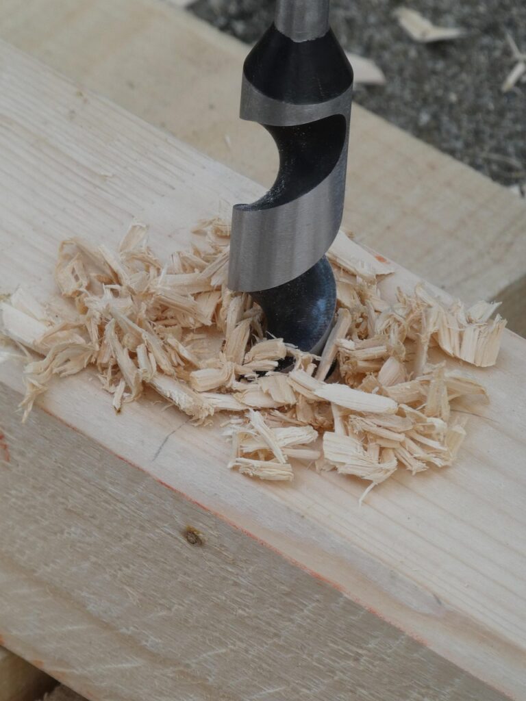 handwork, wood, drill, hand drill, chips, drill, drill, drill, drill, drill, hand drill, chips